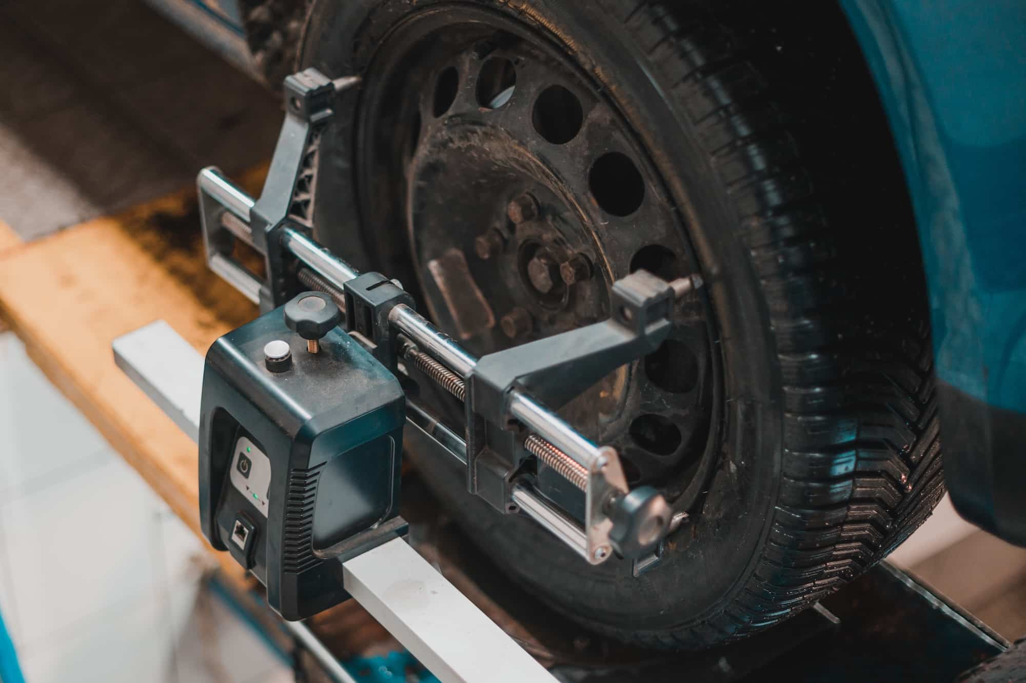 Front end alignment camber measurement on a performance vehicle