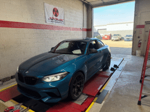2020 BMW M2 Competition with Apex wheels and track alignment at Atomic Autosports.