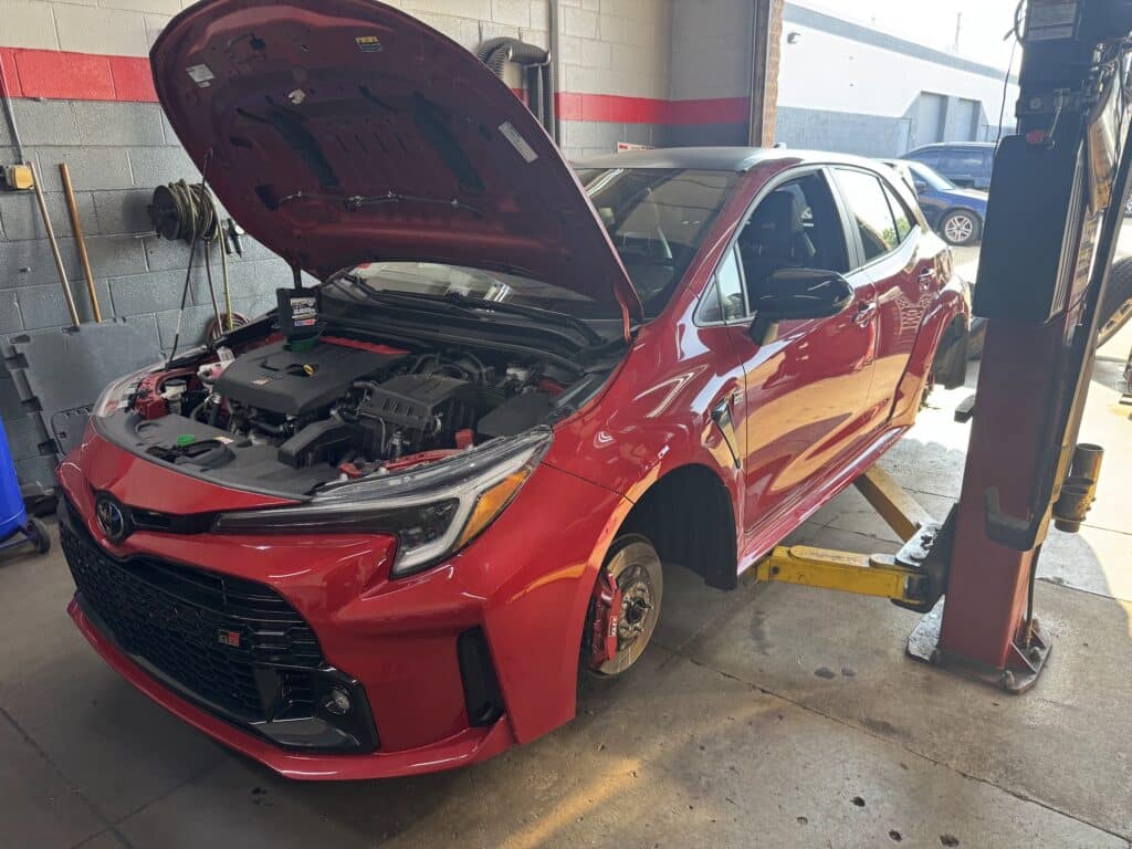 2023 GR Corolla receiving alignment and track prep service at Atomic Autosports.