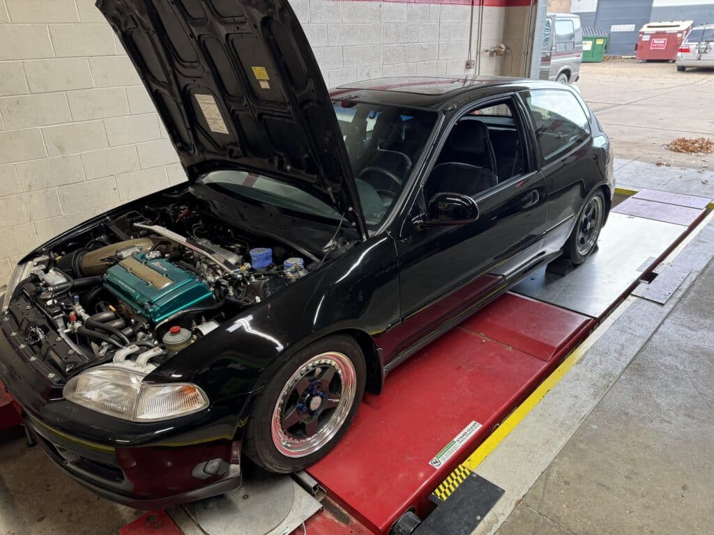1993 Honda Civic Si on the alignment rack at Atomic Autosports.