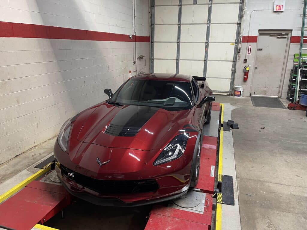 2019 Corvette Grand Sport receiving tires and alignment service at Atomic Autosports.