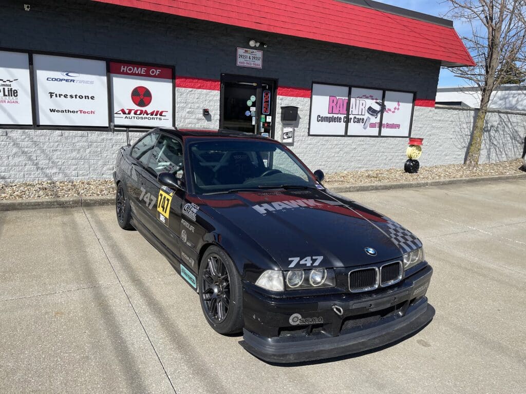 1995 BMW M3 receiving new tires and alignment at Atomic Autosports.