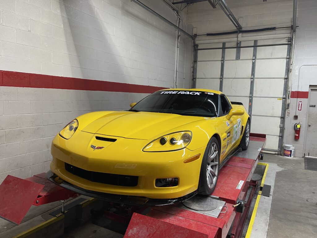 2006 Corvette Z06 receiving tire service and custom alignment at Atomic Autosports.