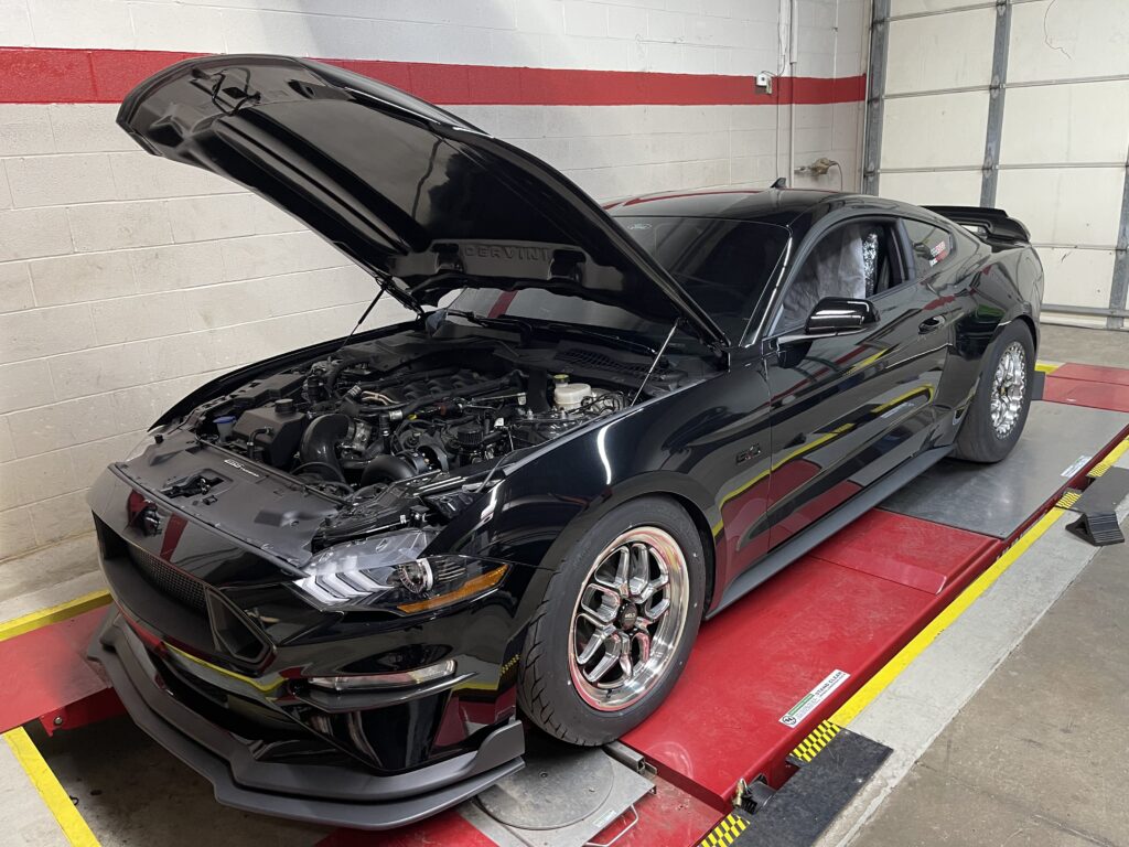 2003 Chevrolet Corvette Z06 receiving alignment and corner balancing at Atomic Autosports.