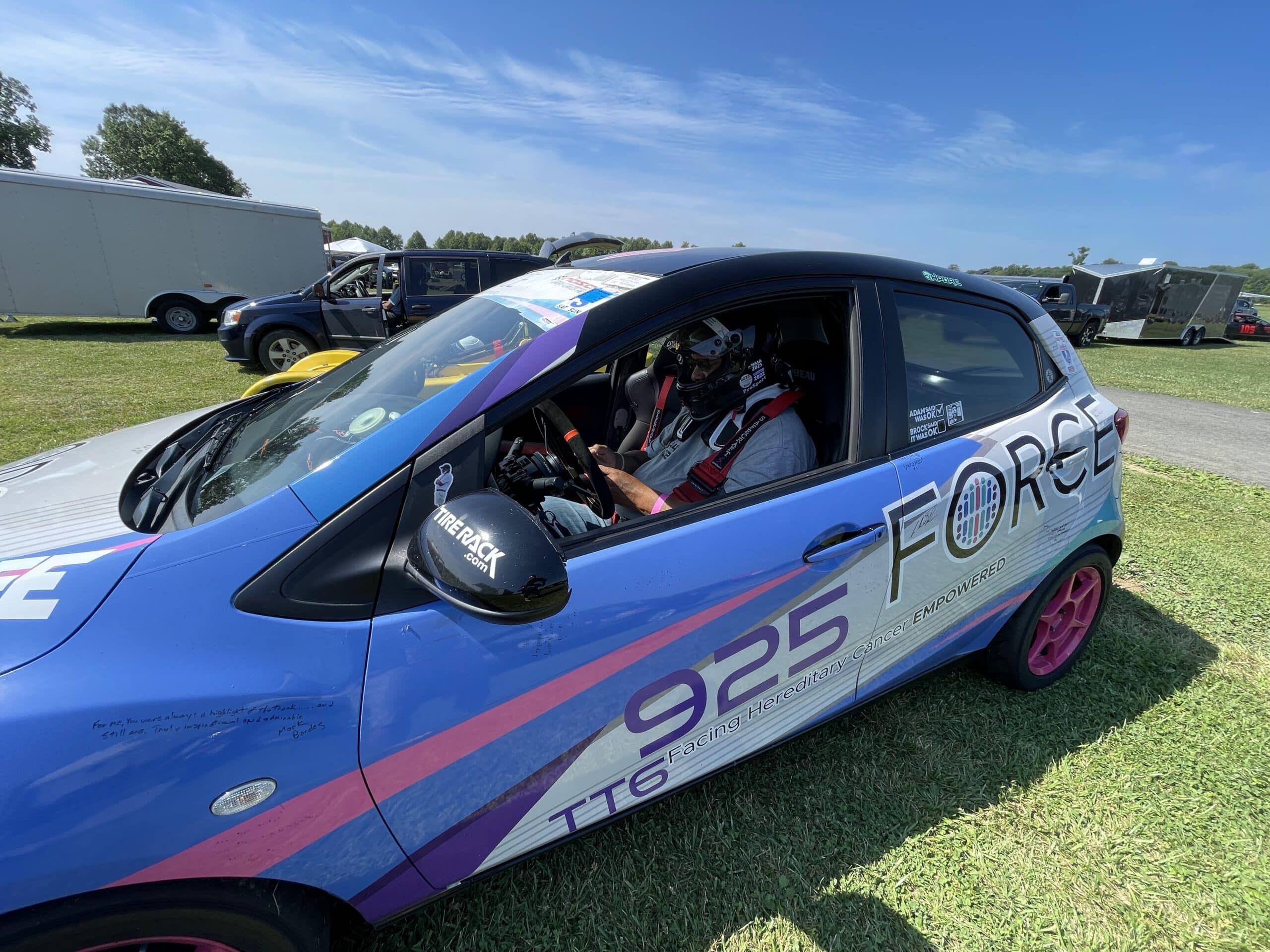 2013 Mazda 2 B-Spec race car on track